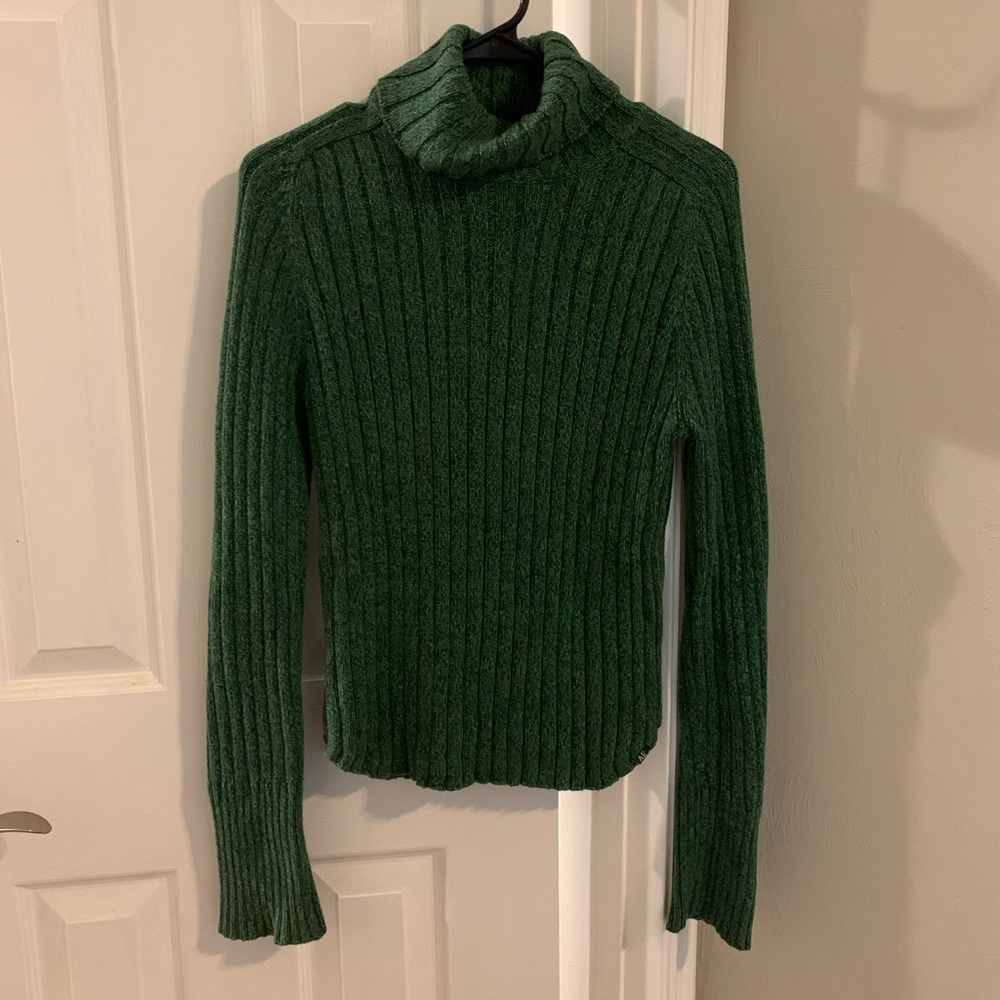 Green turtleneck sweater